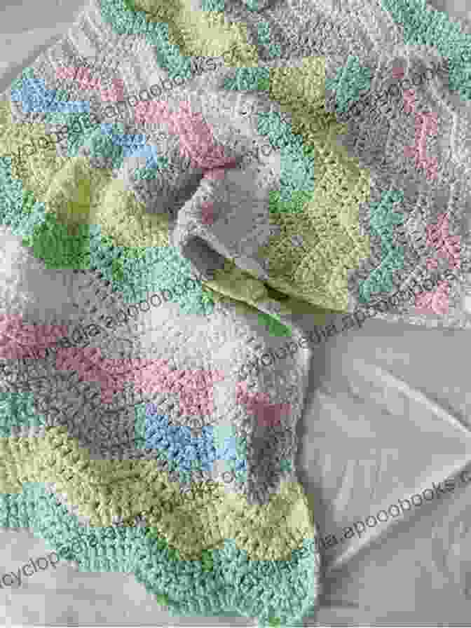 A Cozy Crochet Blanket In Soft, Pastel Colors, Draped Over A Bed. Crochet Madder Triangles: 8 Exciting Crochet Projects Including Blankets Scarves Shawls All Made With Variations Of A Simple Triangle Crochet Motif