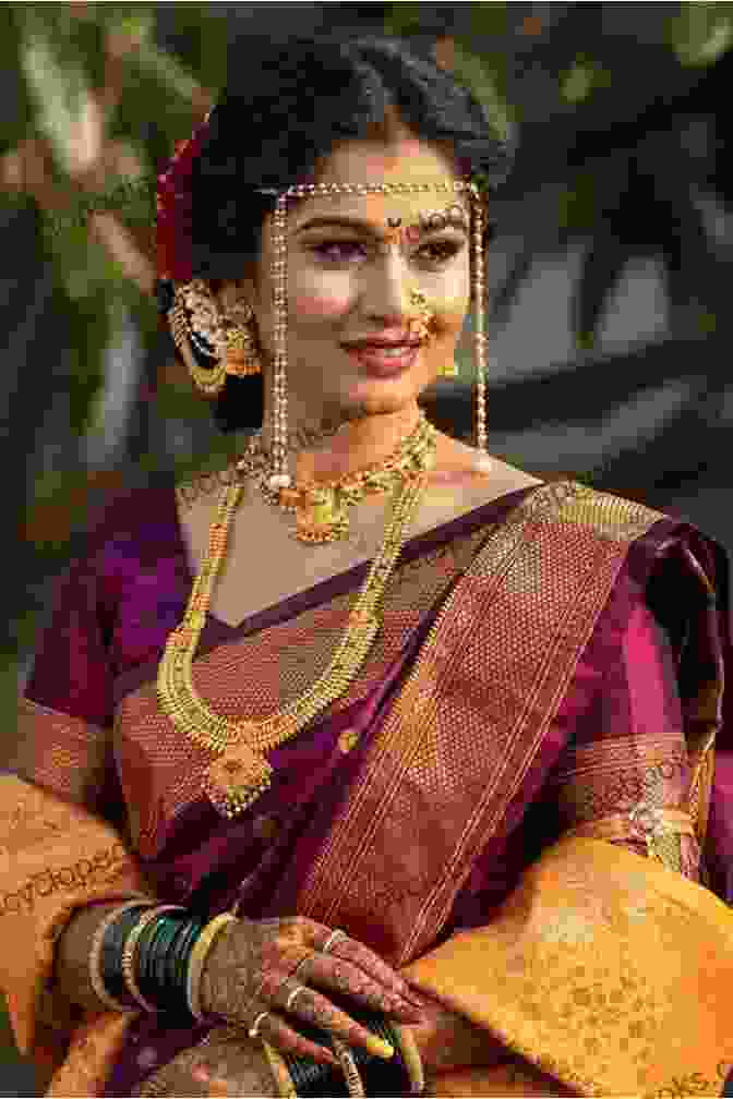 A Portrait Of A Young Indian Woman Wearing A Colorful Sari And Traditional Jewelry. THE FACES OF INDIA: A Photographic Journey (India Travel)