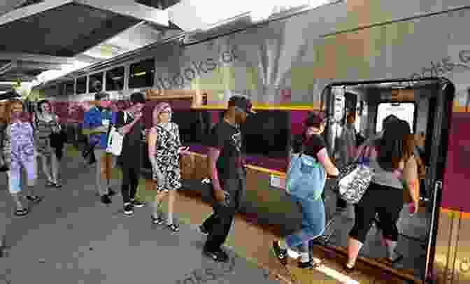 Passengers Boarding A Massachusetts Commuter Rail Train Massachusetts Commuter Rail Trains John Nelson